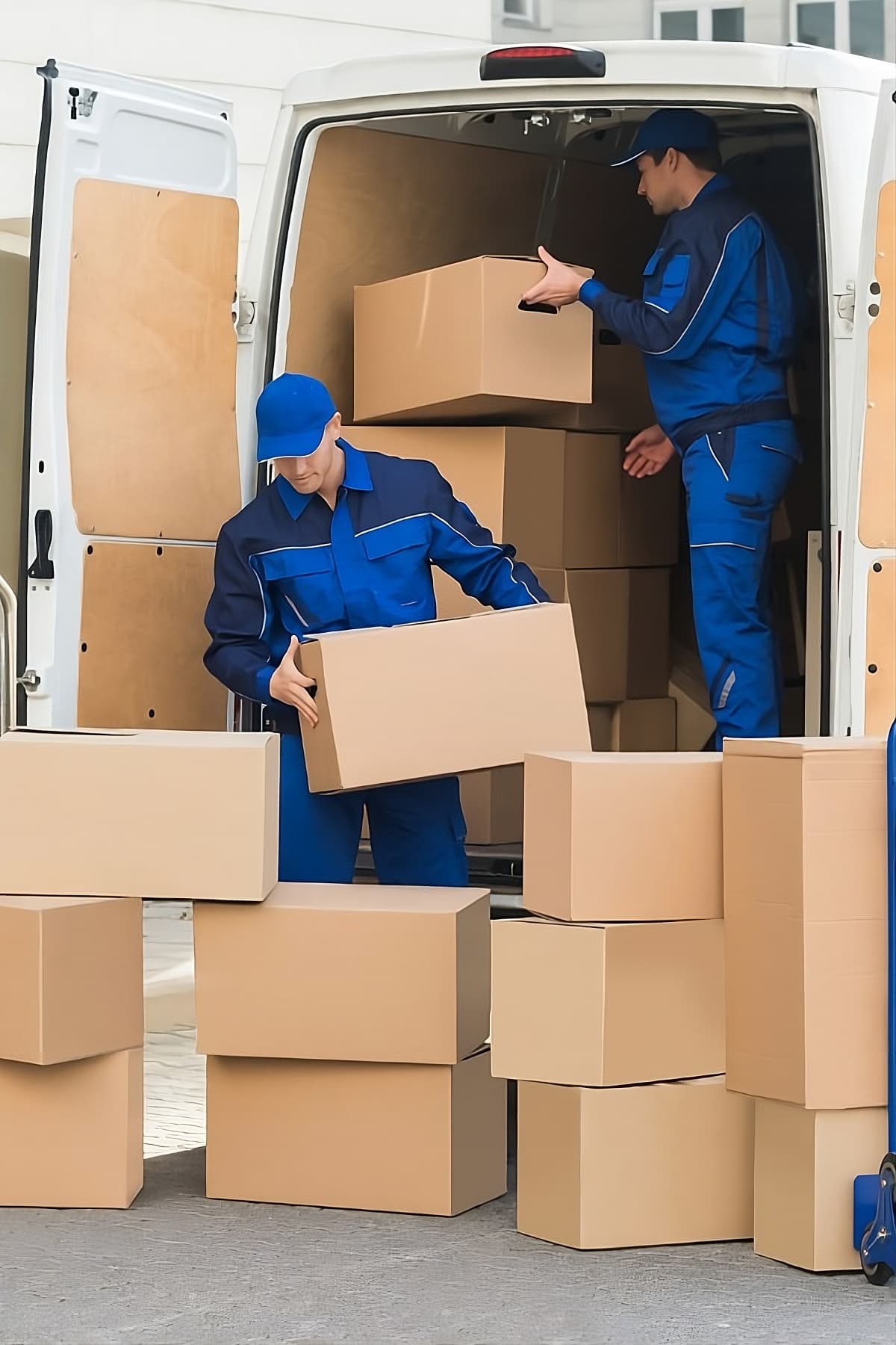 people moving packages from a truck
